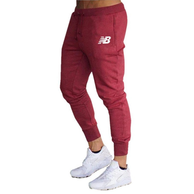 Hot sale solid casual Mens Casual Slim Fit Tracksuit Sports Solid Male Gym Cotton Skinny Joggers Sweat Casual Pants Trousers